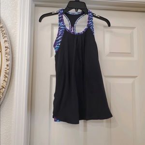 ivivva girls sleeveless tank top is a size 10.
